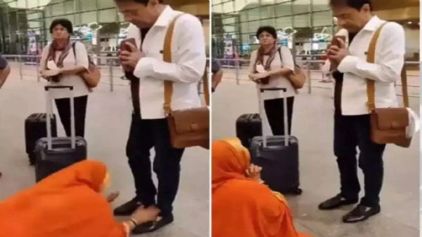 Woman touches feet of Ramayan fame Arun Govil at the airport